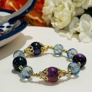 Elegant Purple and Gold Bracelet with Beaded Design